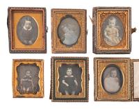 [EARLY PHOTOGRAPHY]. 23 ninth plate daguerreotypes of babies and toddlers.