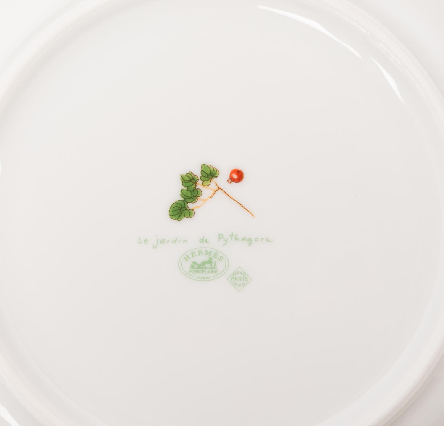 A Group of Hermès Le Jardin de Pythagore Porcelain Dinnerware Articles