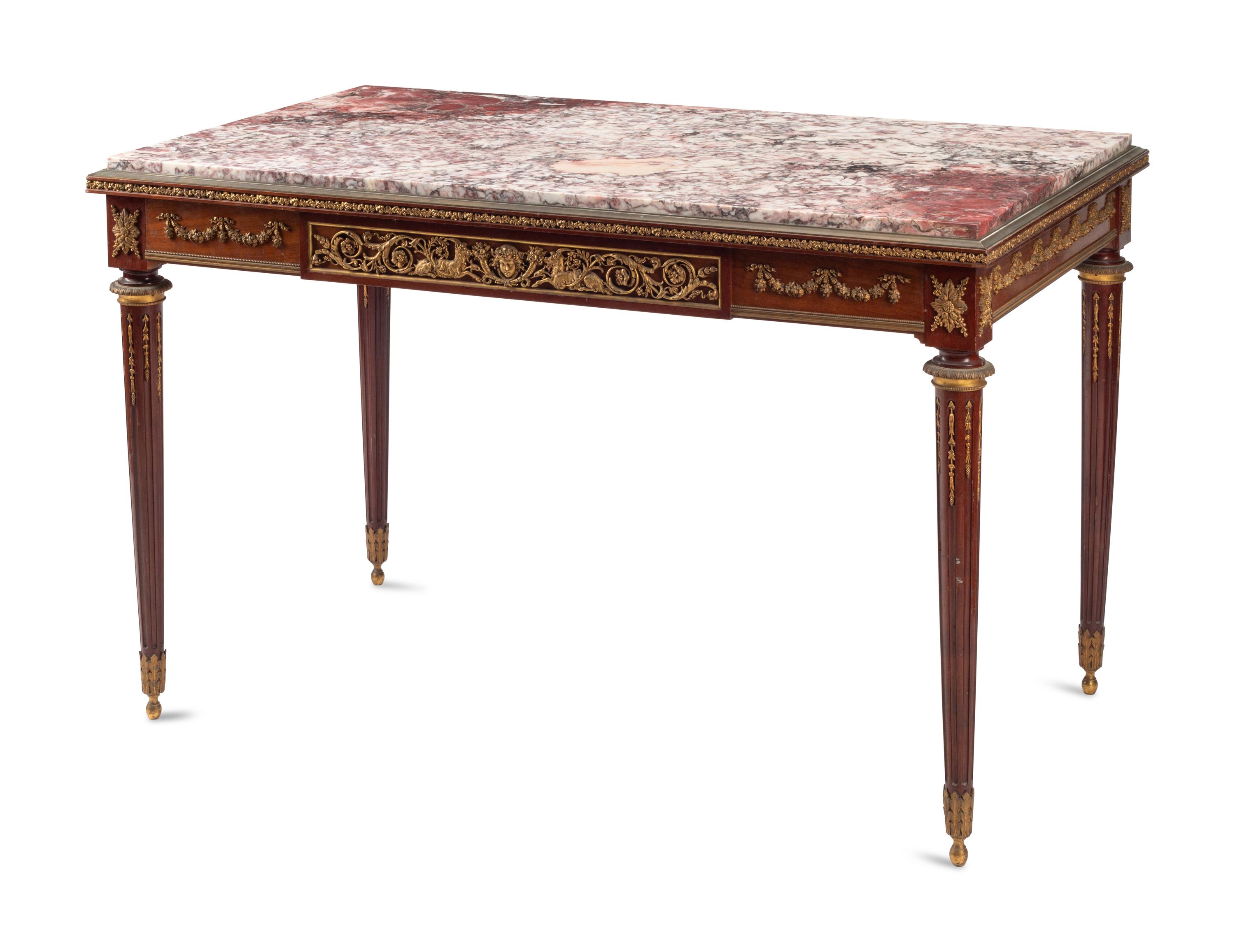 A Louis XVI Style Gilt Bronze Mounted Mahogany Marble-Top Table