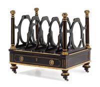 A Continental Ebonized and Parcel Gilt Canterbury Height 19 x width 19 1/2 x depth 13 1/2 inches. — 19TH CENTURY