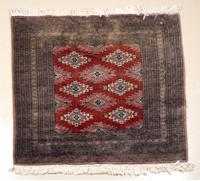 A Bokhara Rug 4 feet 2 inches x 3 feet 9 inches.