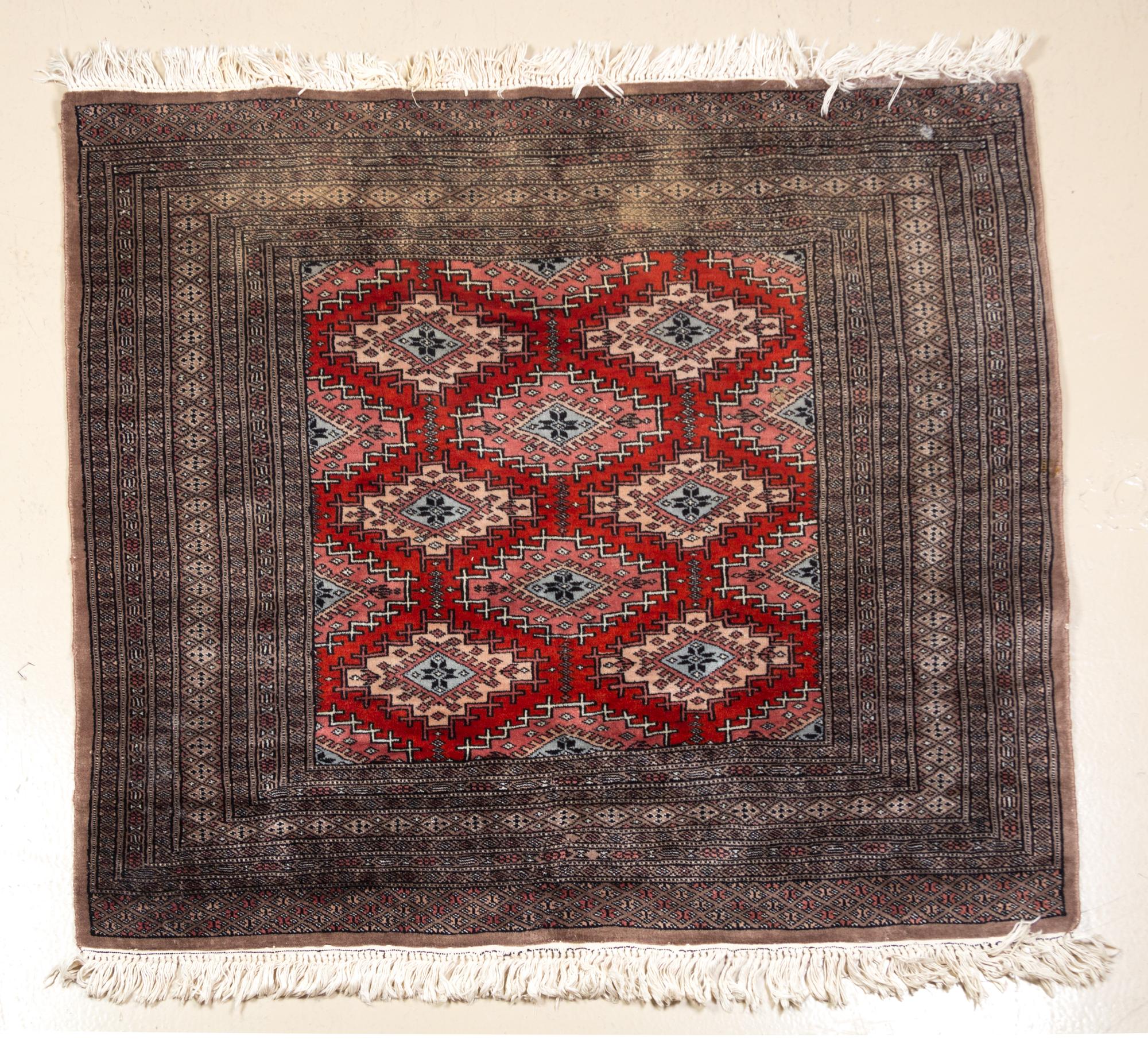 A Bokhara Rug 4 feet 2 inches x 3 feet 9 inches.
