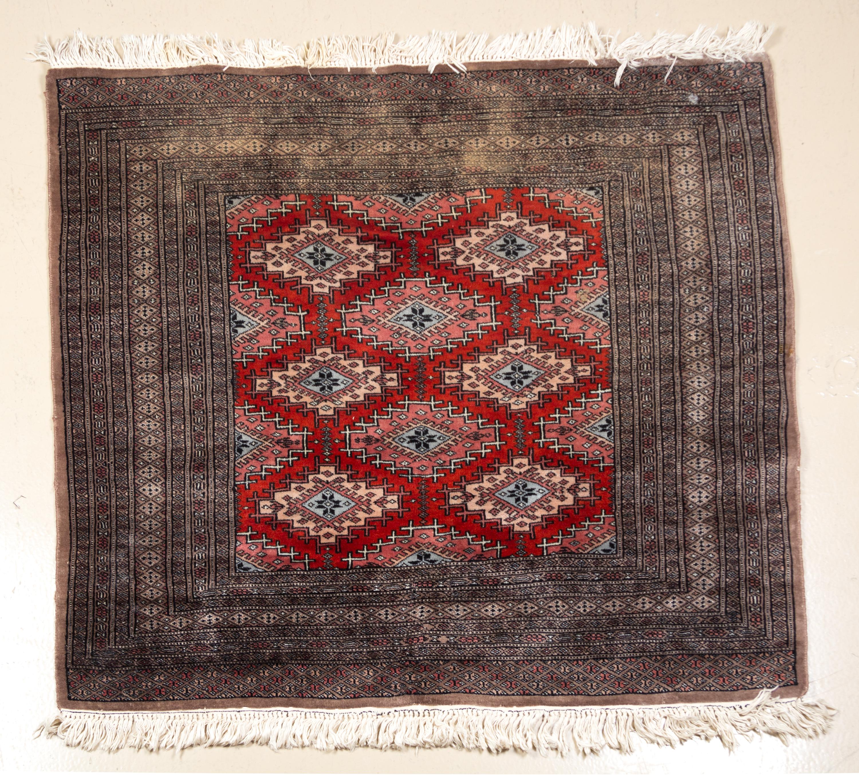 A Bokhara Rug 4 feet 2 inches x 3 feet 9 inches.
