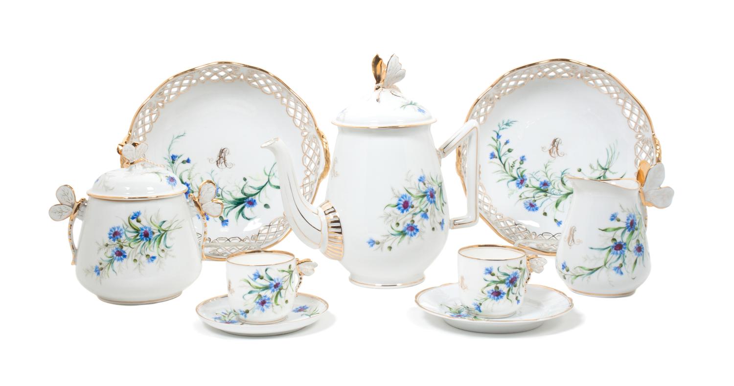 A Continental Porcelain Dessert Service Height of first 8 1/4 inches. — 20TH CENTURY