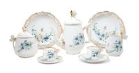 A Continental Porcelain Dessert Service Height of first 8 1/4 inches. — 20TH CENTURY