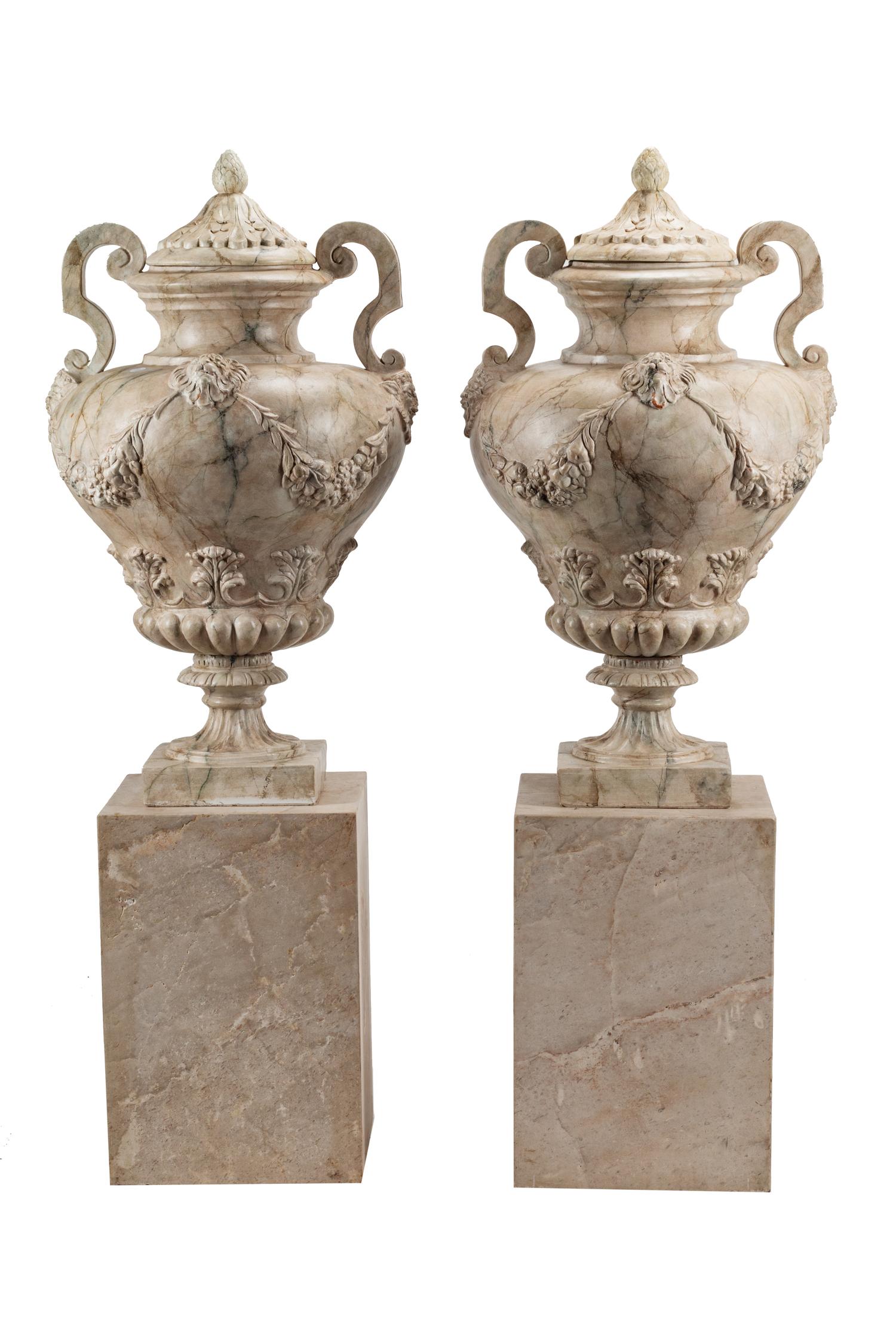 A Pair of Neoclassical Style Faux Marble Painted Terracotta Urns and Stone Plinths