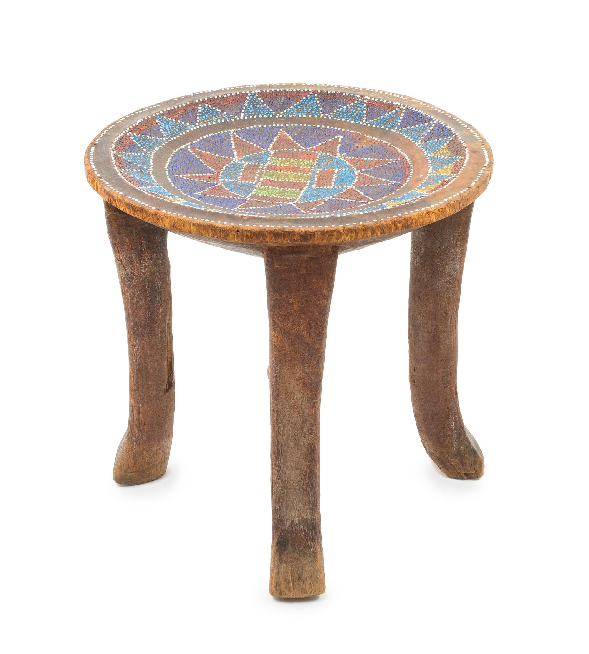 An Asante Beaded and Carved Wood Chief's Stool Height 12 1/4 x diameter of top 12 7/8 inches. — 20TH CENTURY