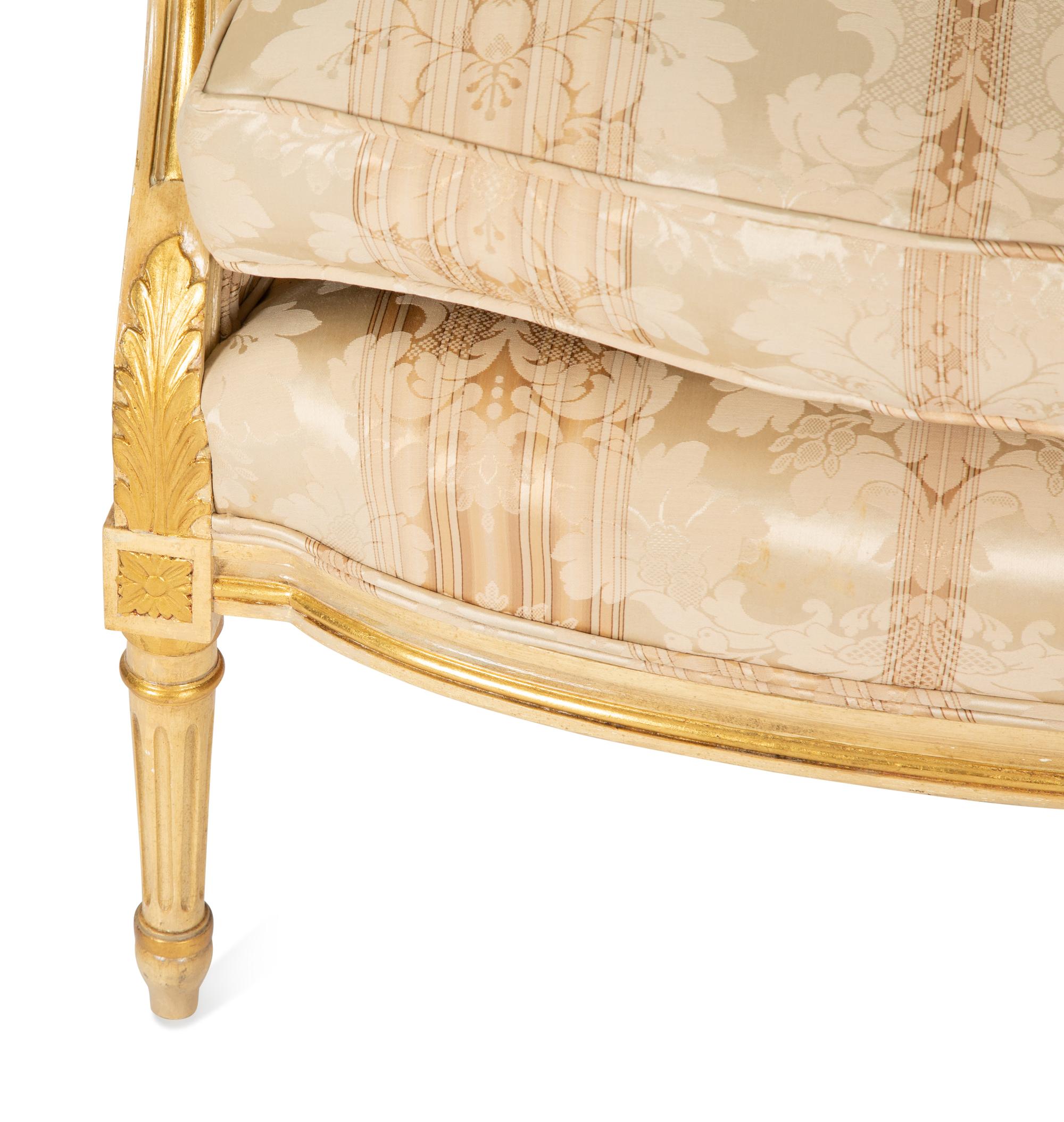 A Louis XV Style Painted and Giltwood Bergère
