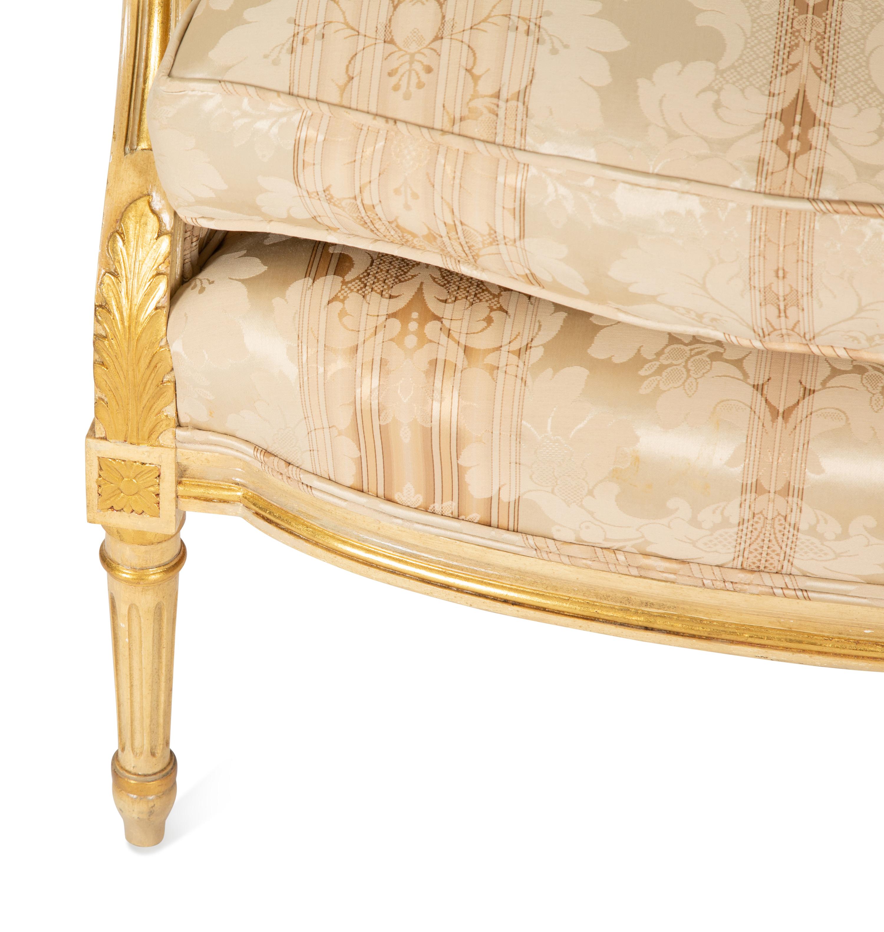 A Louis XV Style Painted and Giltwood Bergère