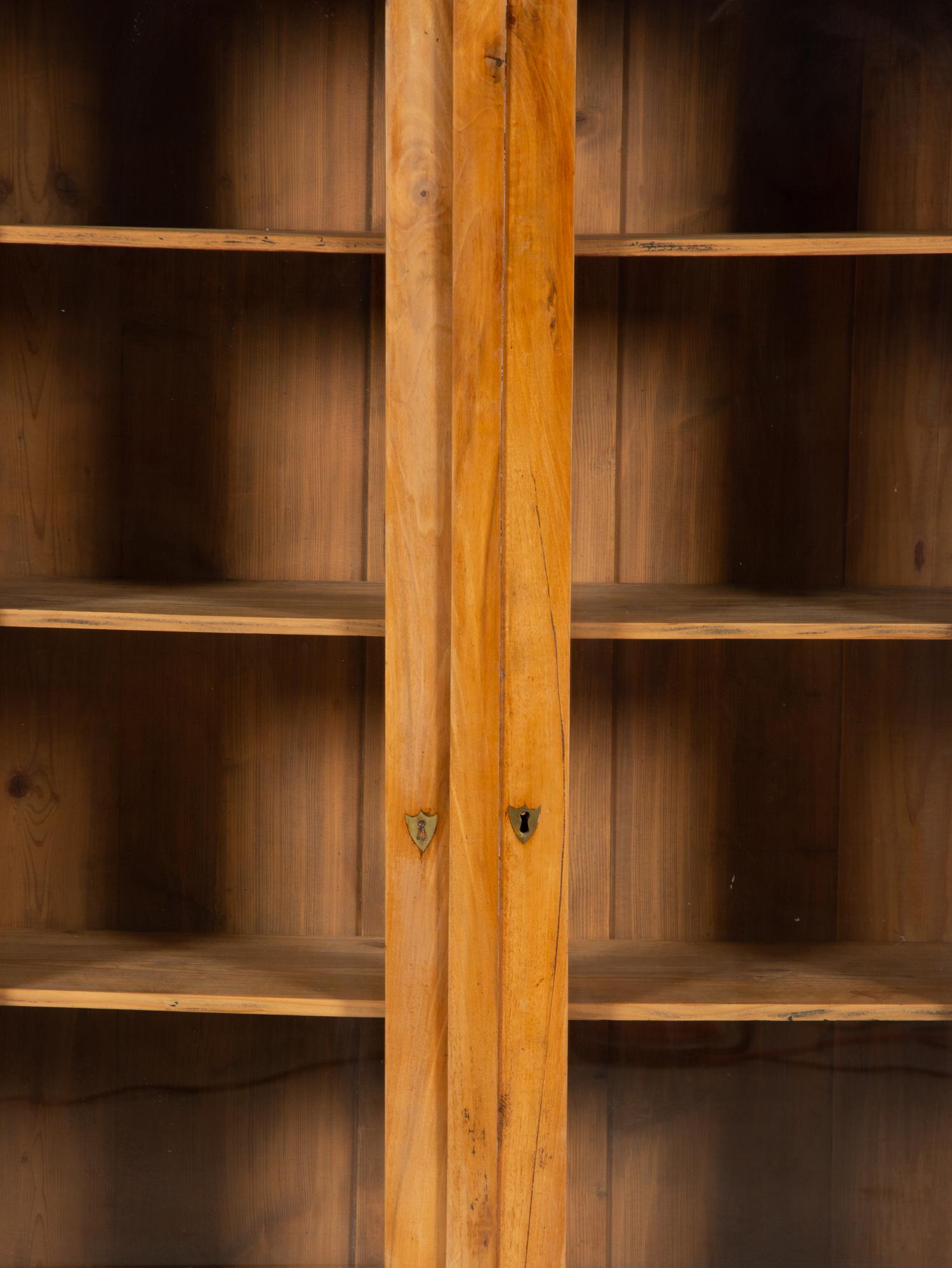 A Pair of Biedermeier Figured Birch Bookcases