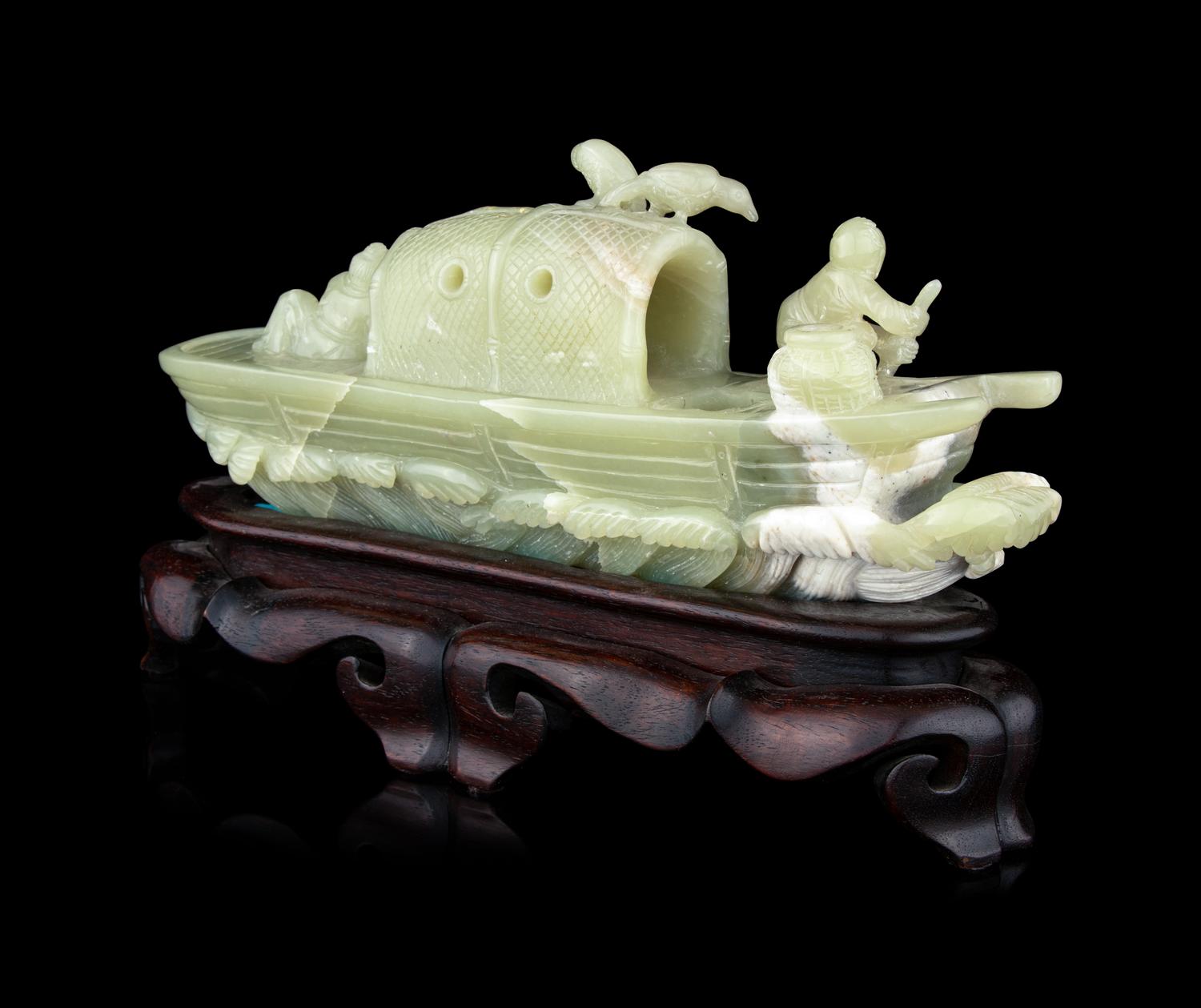 A Chinese Celadon Jade Boat