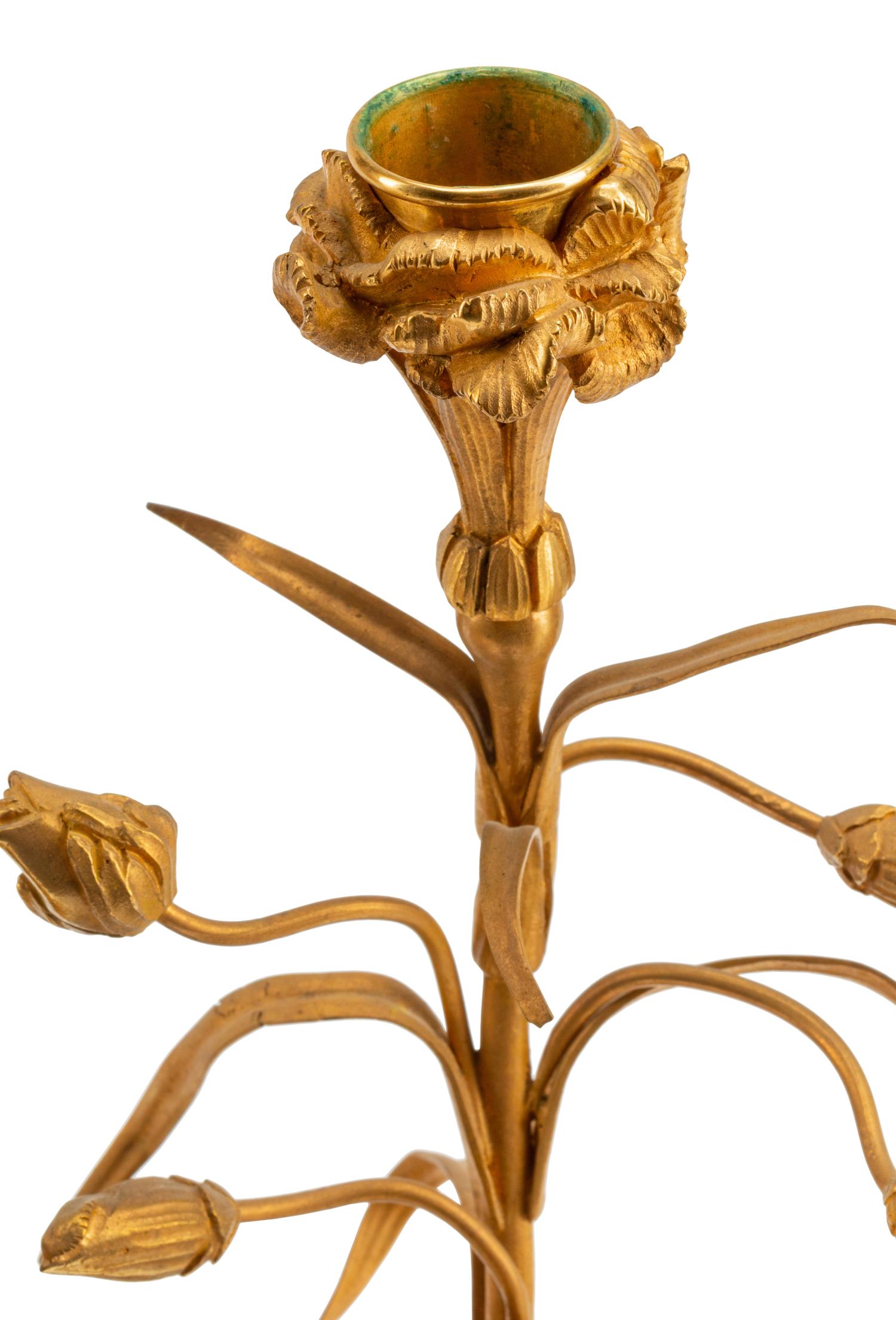 A Pair of French Gilt Bronze and Marble Three-Light Candelabra