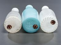 Three Opalescent Swirl Glass Barber Bottles
