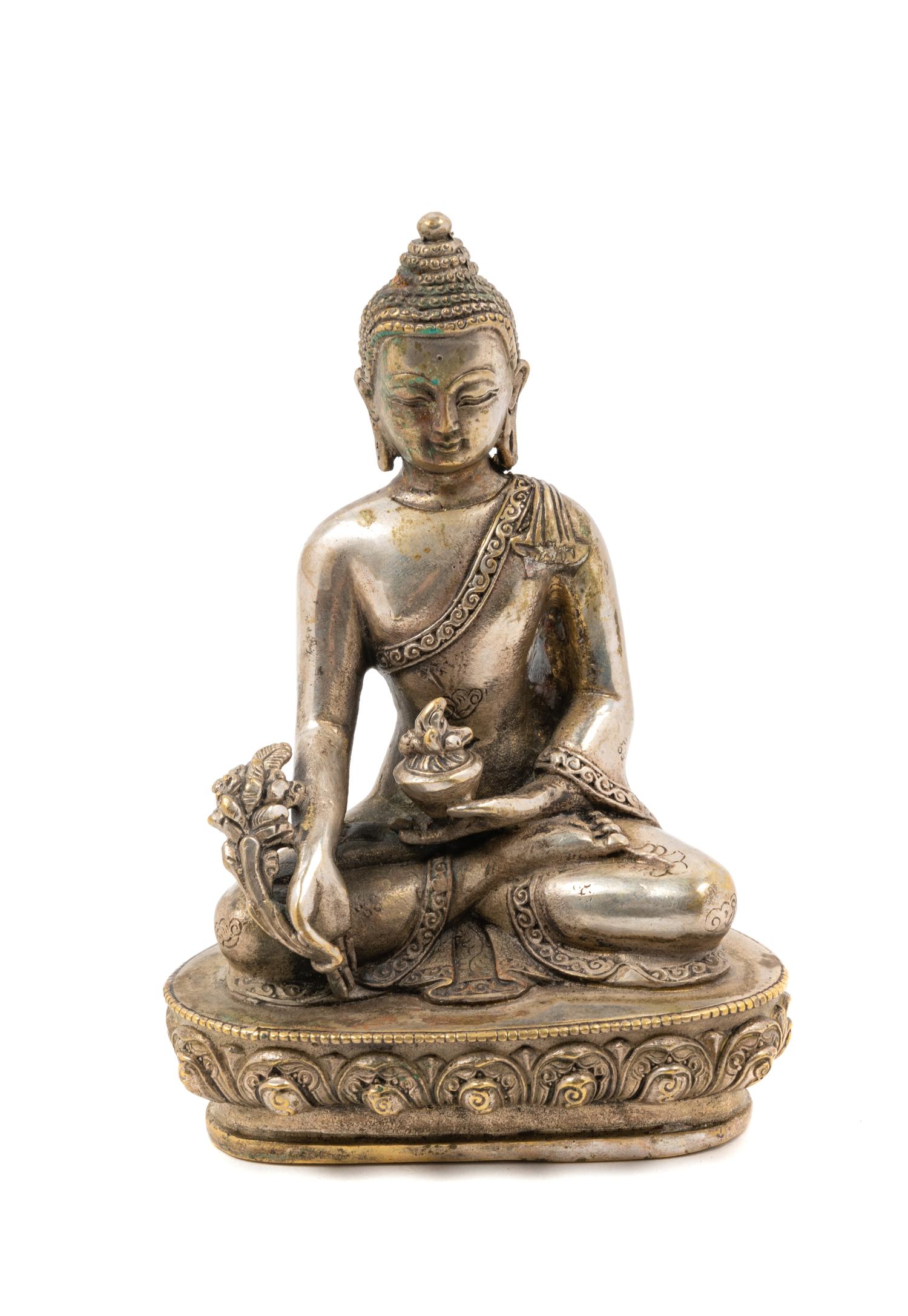 A Sino-Tibetan Bronze Figure of Seated Buddha