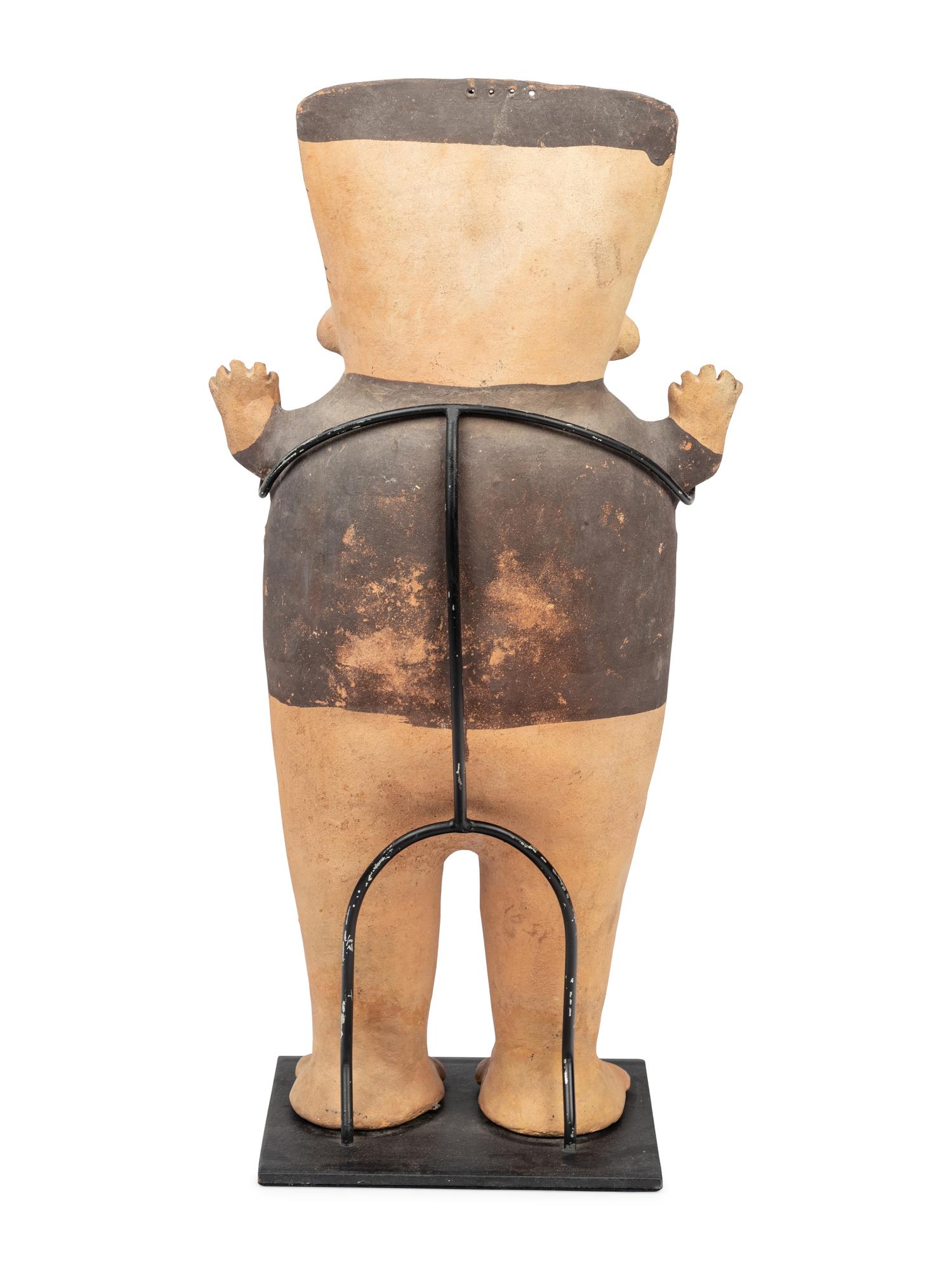A Chancay Bichrome Figure