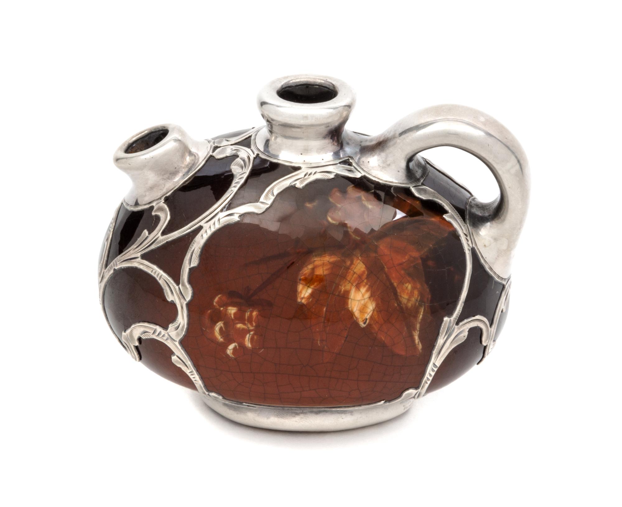 A Weller Louwelsa Silver Overlay Diminutive Pitcher Width 3 1/2 inches.