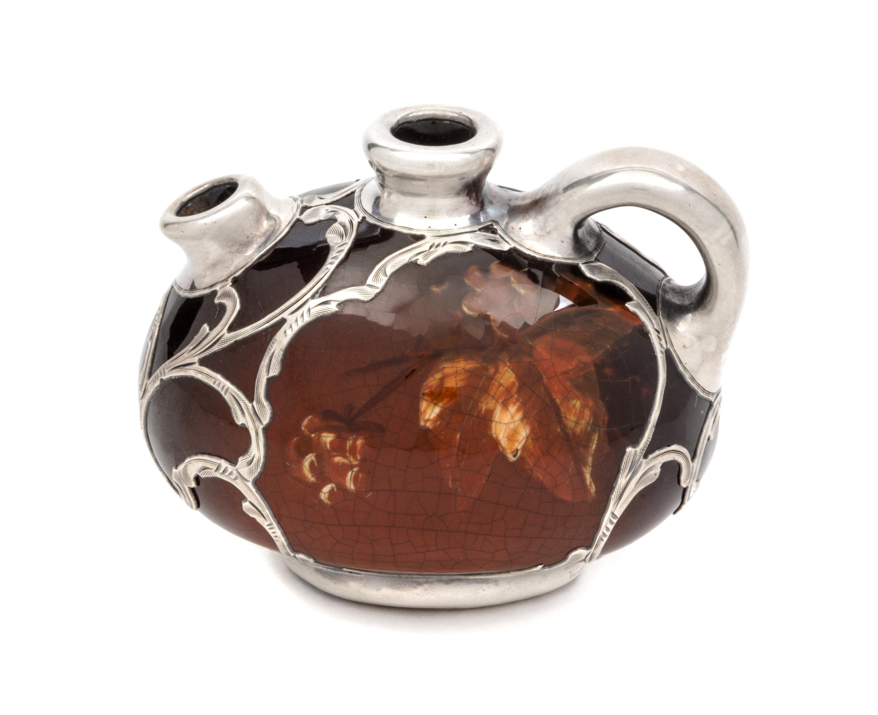 A Weller Louwelsa Silver Overlay Diminutive Pitcher Width 3 1/2 inches.