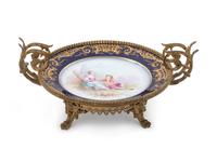 A Sèvres Style Bronze Mounted Painted and Parcel Gilt Porcelain Compote