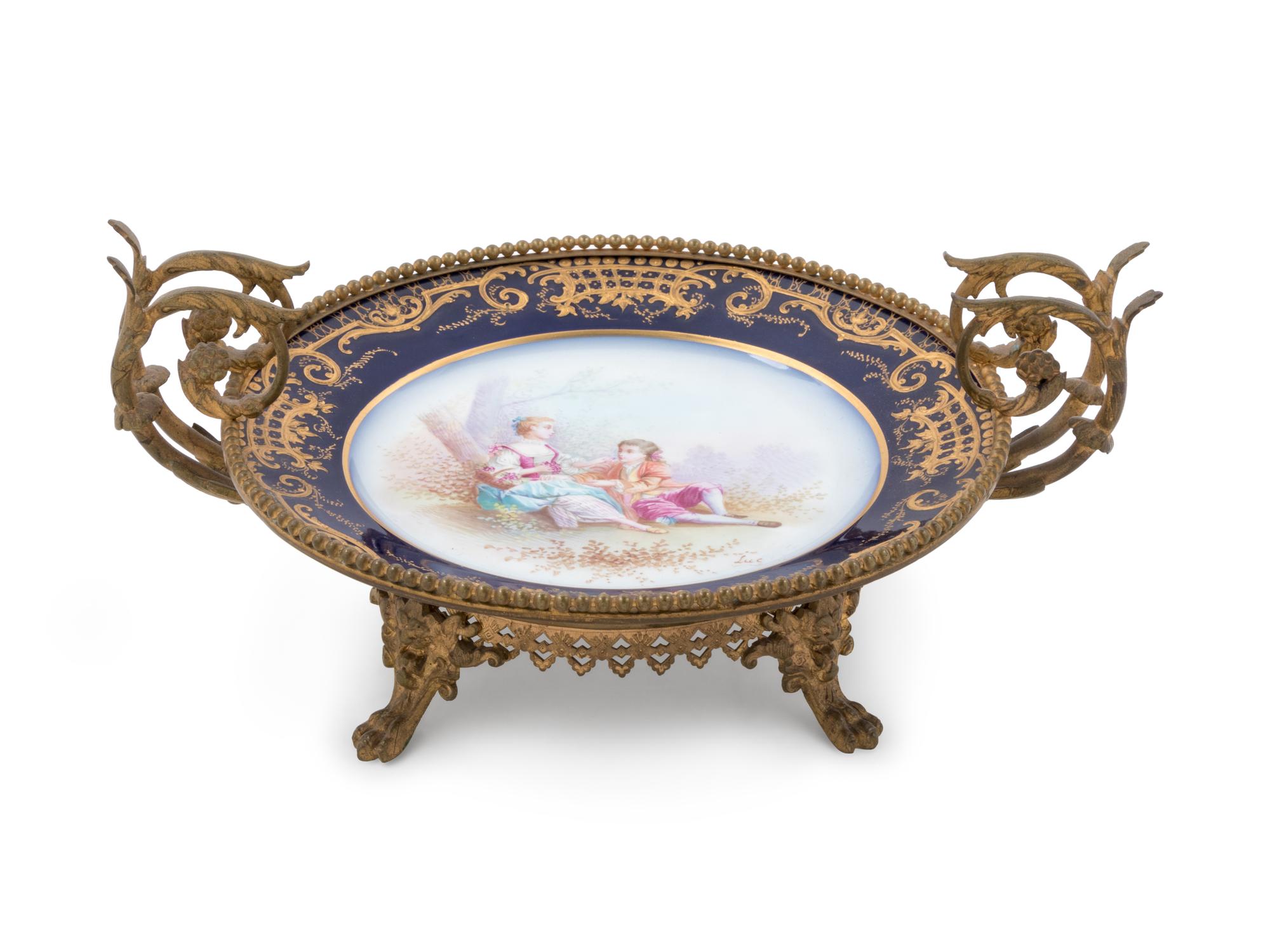 A Sèvres Style Bronze Mounted Painted and Parcel Gilt Porcelain Compote