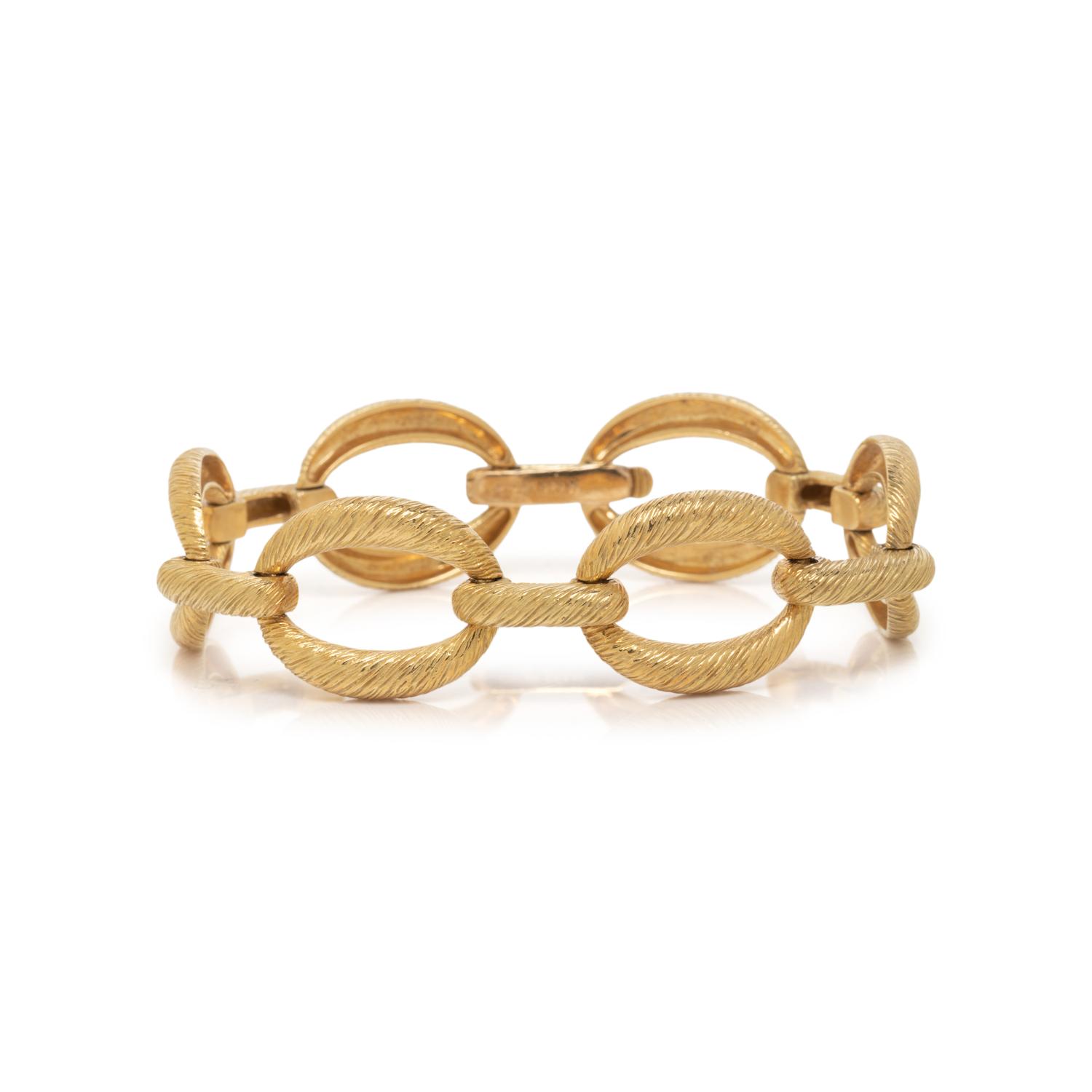 SUNA, YELLOW GOLD BRACELET