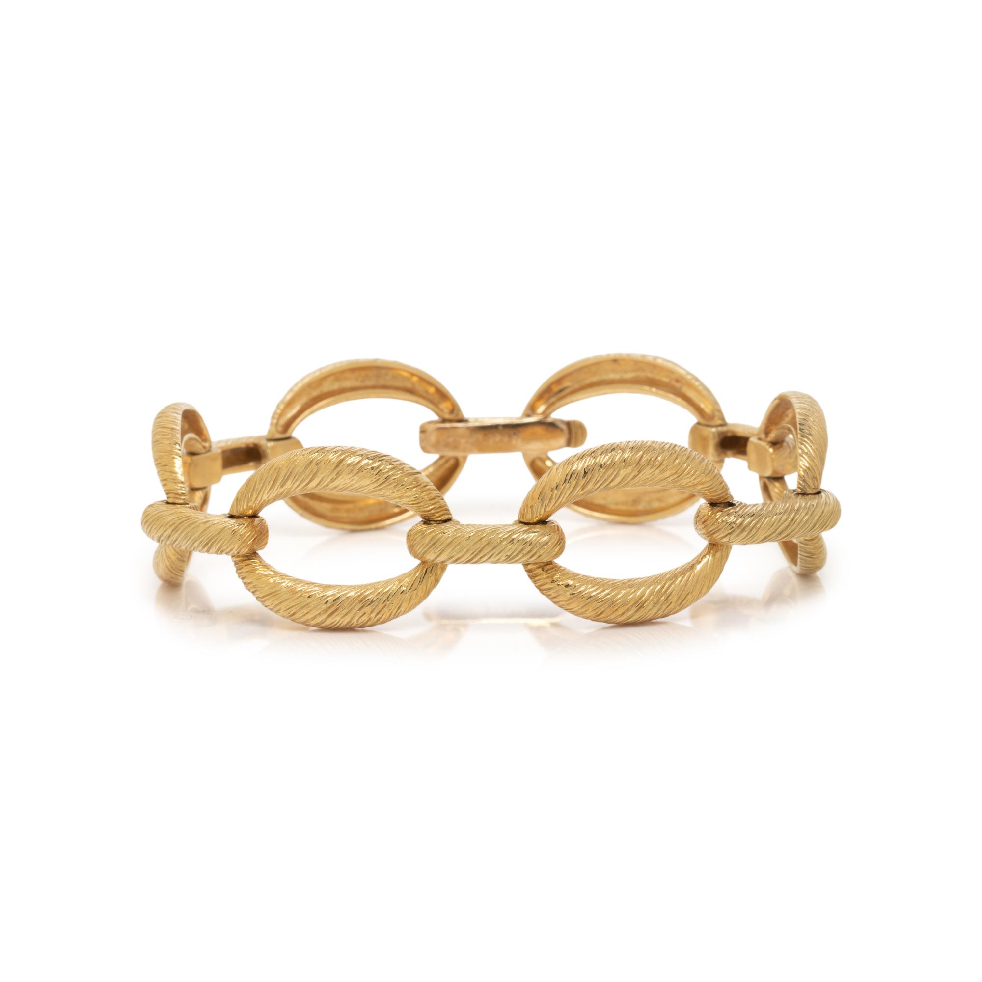 SUNA, YELLOW GOLD BRACELET