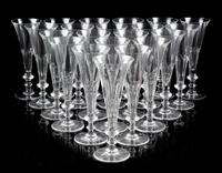 A Set of Forty-Five William Yeoward Glass Champagne Flutes Height 8 1/8 inches.