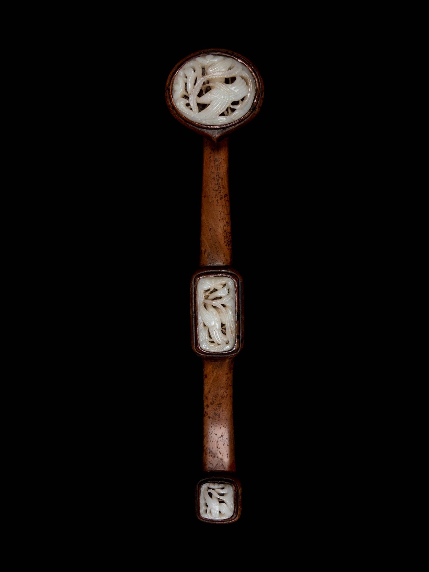 A Chinese White Jade Inset Hardwood Ruyi Scepter