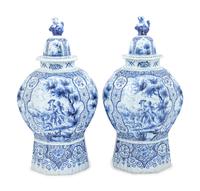 A Pair of Large Delftware Vases and Covers