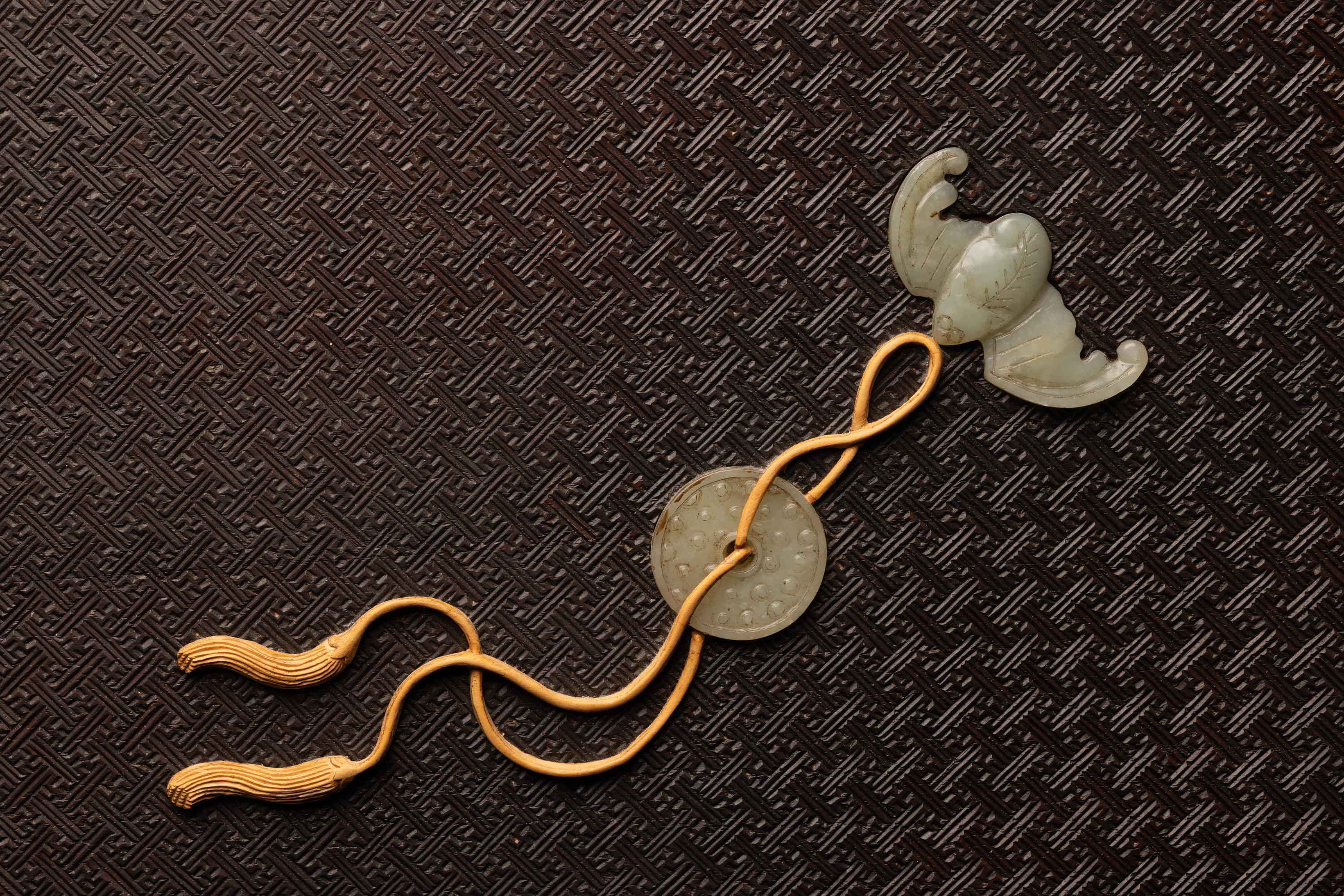 A Chinese Jade and Hardstone Inset Hardwood Wall Panel