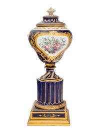 A Sèvres Style Painted and Parcel Gilt Porcelain Urn