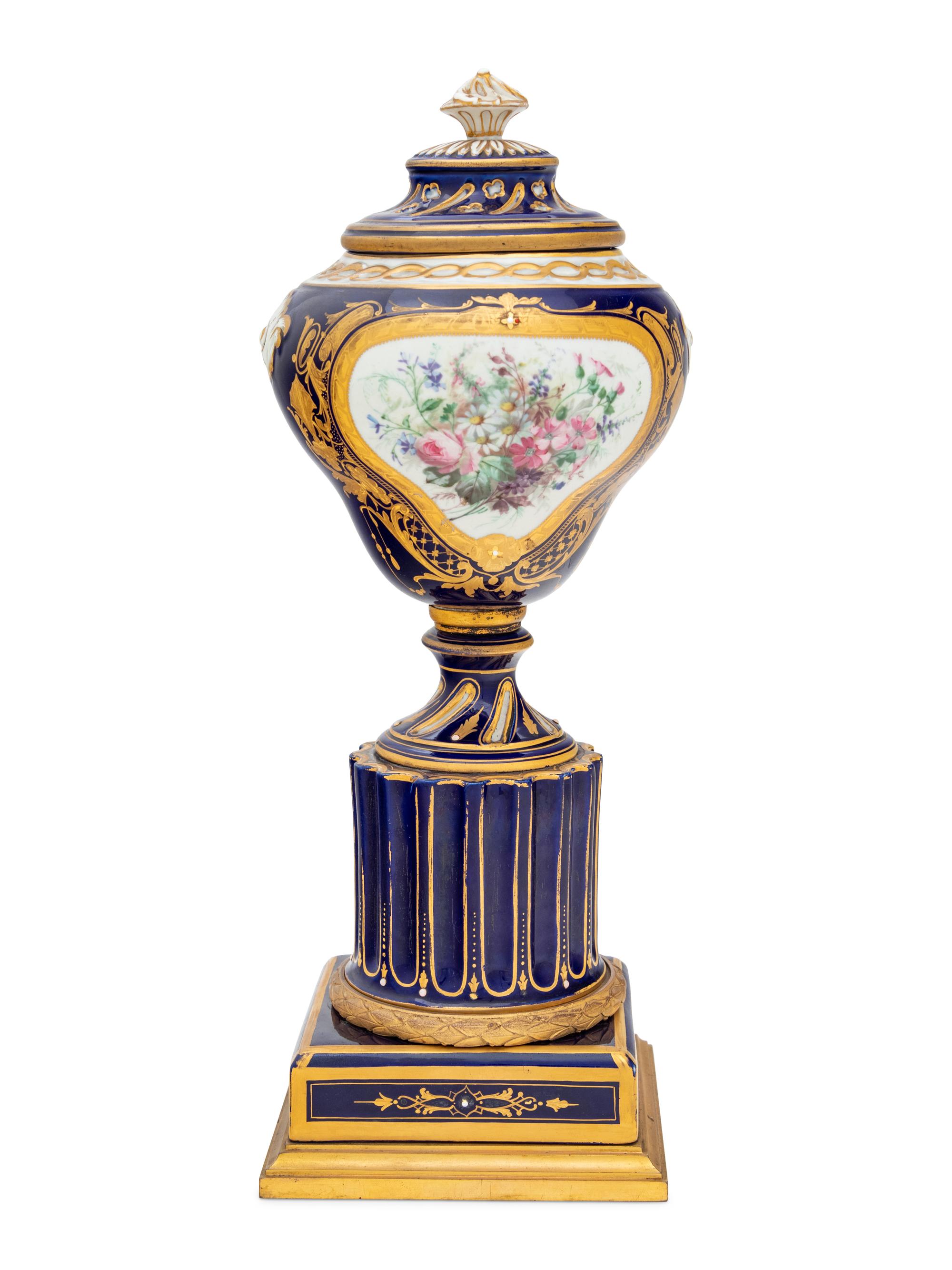 A Sèvres Style Painted and Parcel Gilt Porcelain Urn