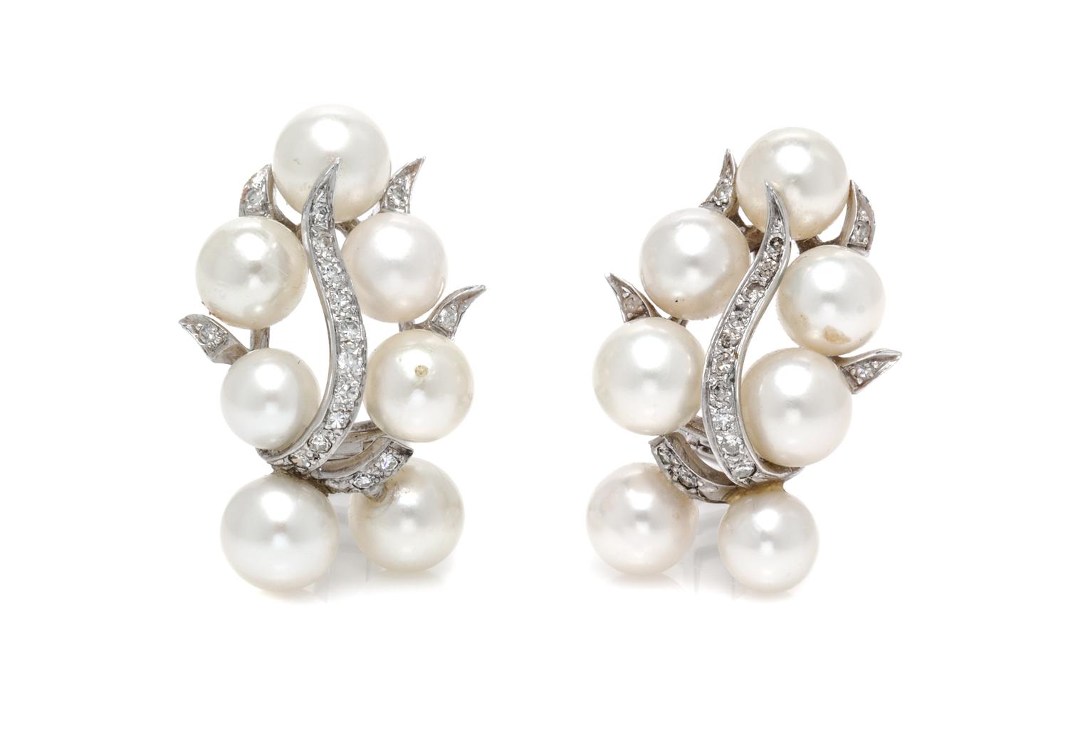 A Pair of White Gold, Cultured Pearl and Diamond Earclips, 10.80 dwts.