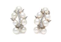 A Pair of White Gold, Cultured Pearl and Diamond Earclips, 10.80 dwts.