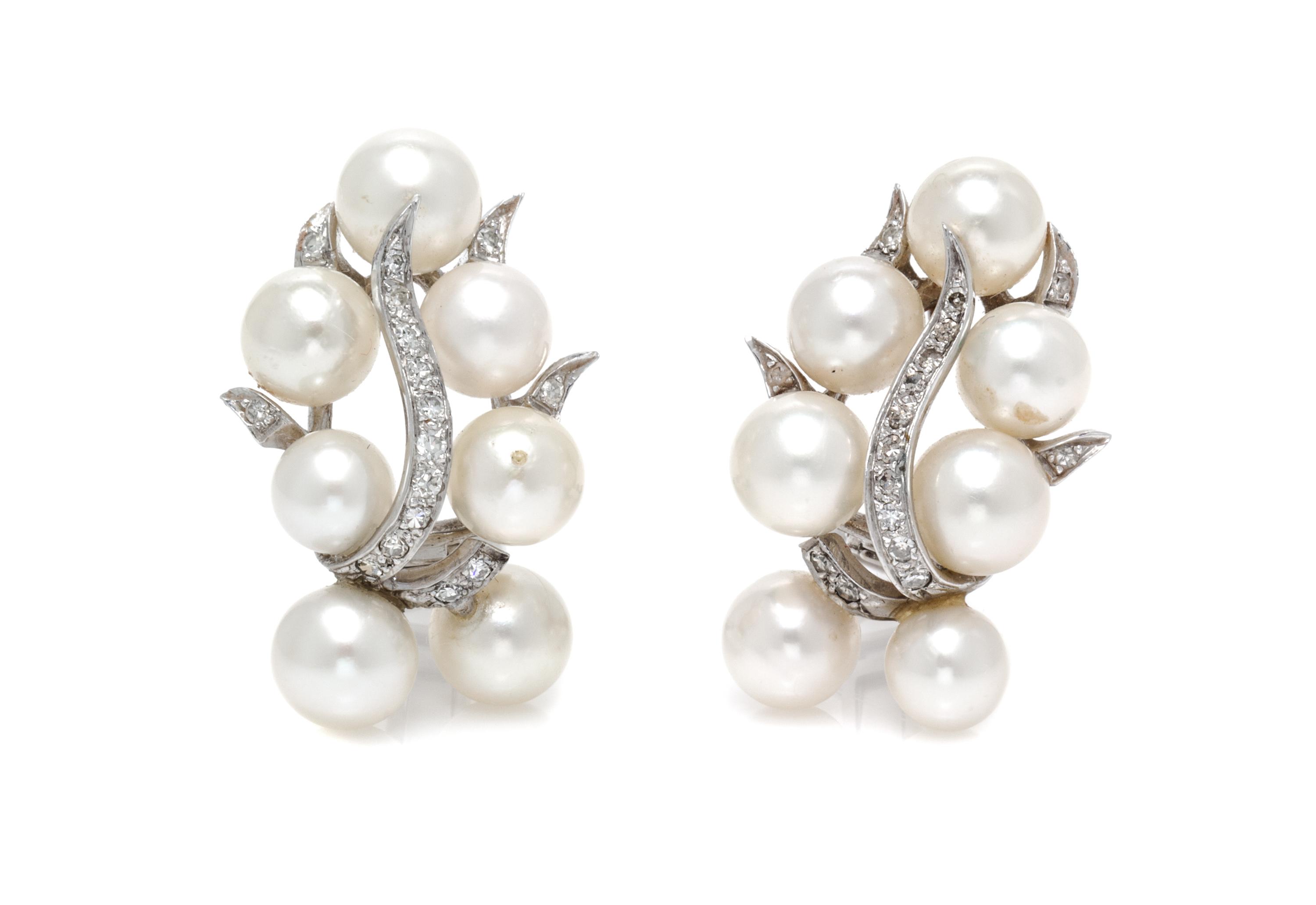 A Pair of White Gold, Cultured Pearl and Diamond Earclips, 10.80 dwts.
