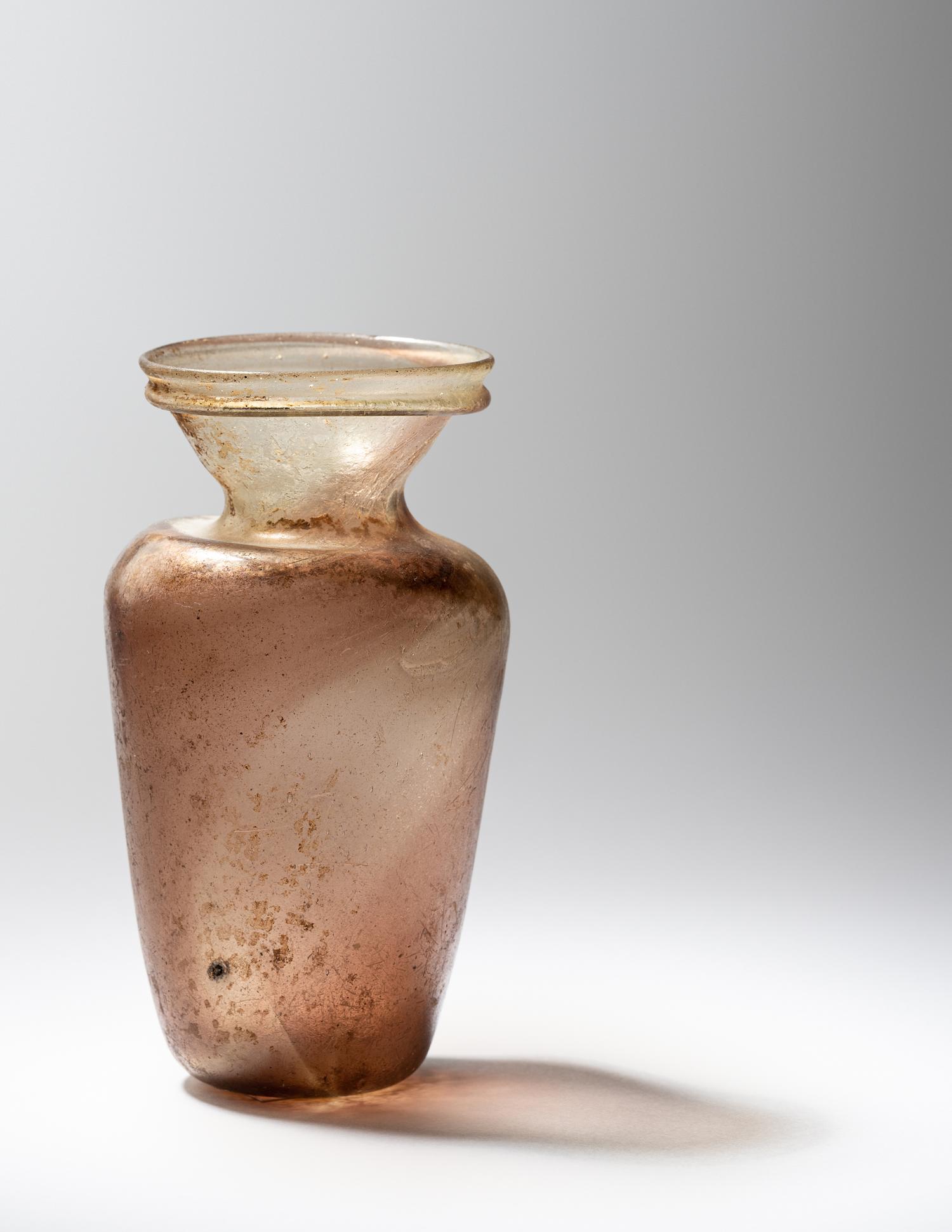 A Roman Aubergine Glass Vessel