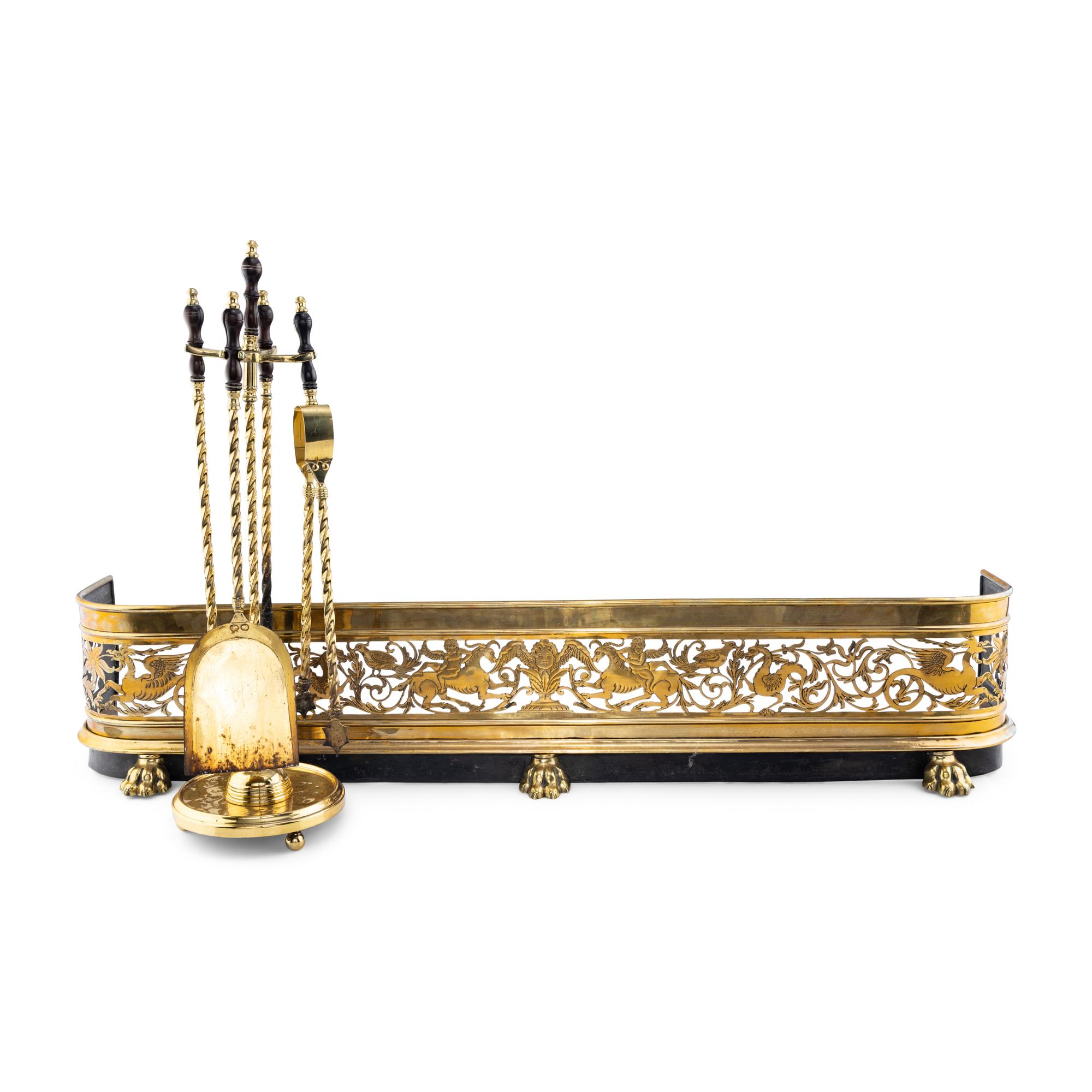 A Brass Fireplace Fender and Fireplace Tools