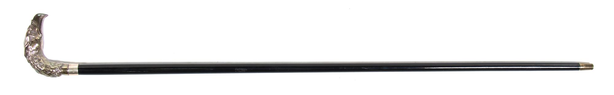 A Sterling Silver Cane Handle, Height overall 36 3/4 x width of handle 4 1/8 inches.