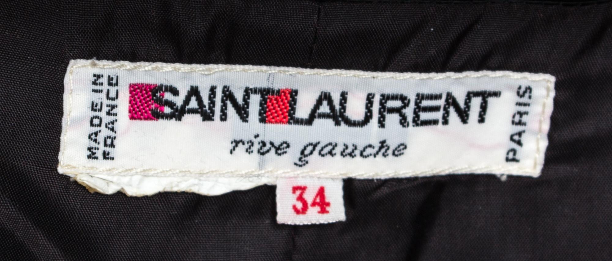 An Yves Saint Laurent Black Jacket, Size 34.