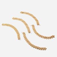 A collection of five fourteen karat gold bracelets