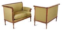 A Pair of Napoleon III Carved Walnut Settees First example: height 33 1/8 x width 43 x depth 24 1/2 inches. — CIRCA 1870