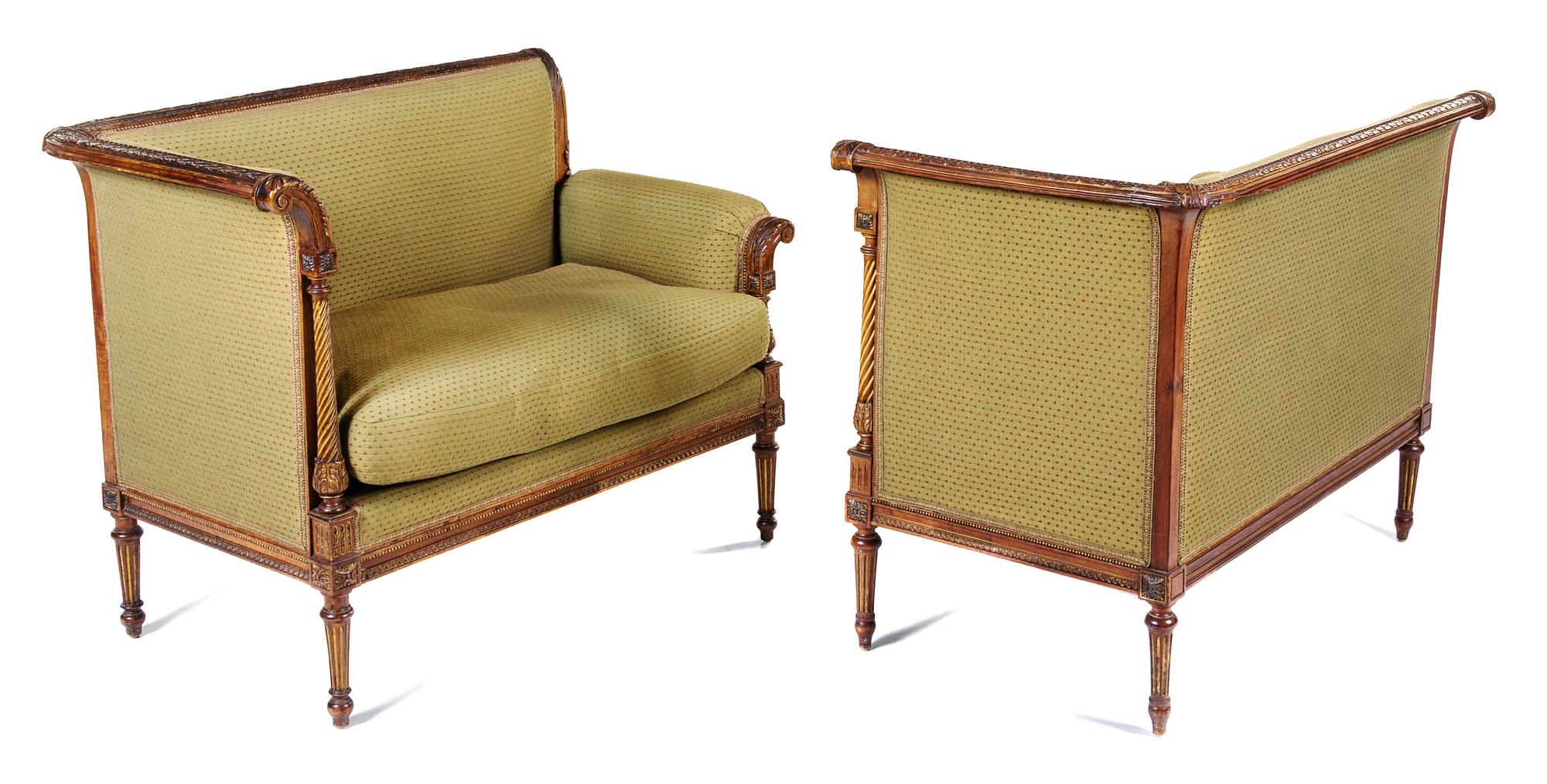 A Pair of Napoleon III Carved Walnut Settees First example: height 33 1/8 x width 43 x depth 24 1/2 inches. — CIRCA 1870
