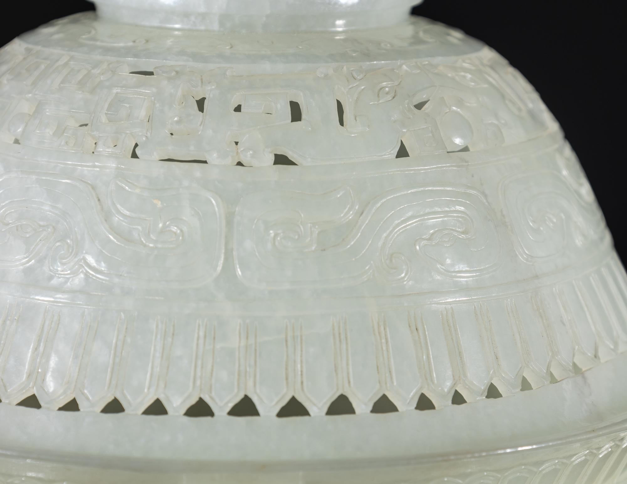 A Chinese Carved and Pierced 'Archaistic' White Jade Bowl and Cover