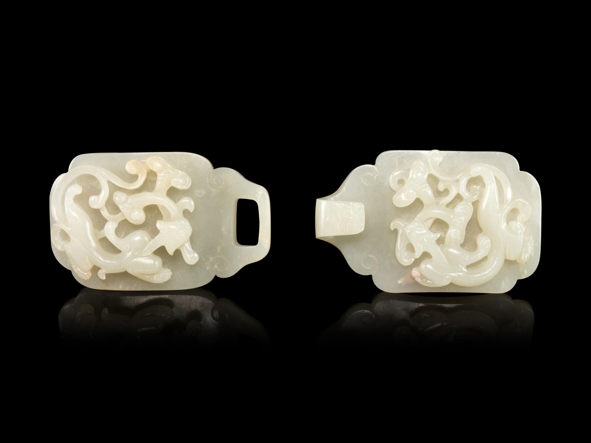 A Carved White Jade ‘Chilong’ Belt Buckle