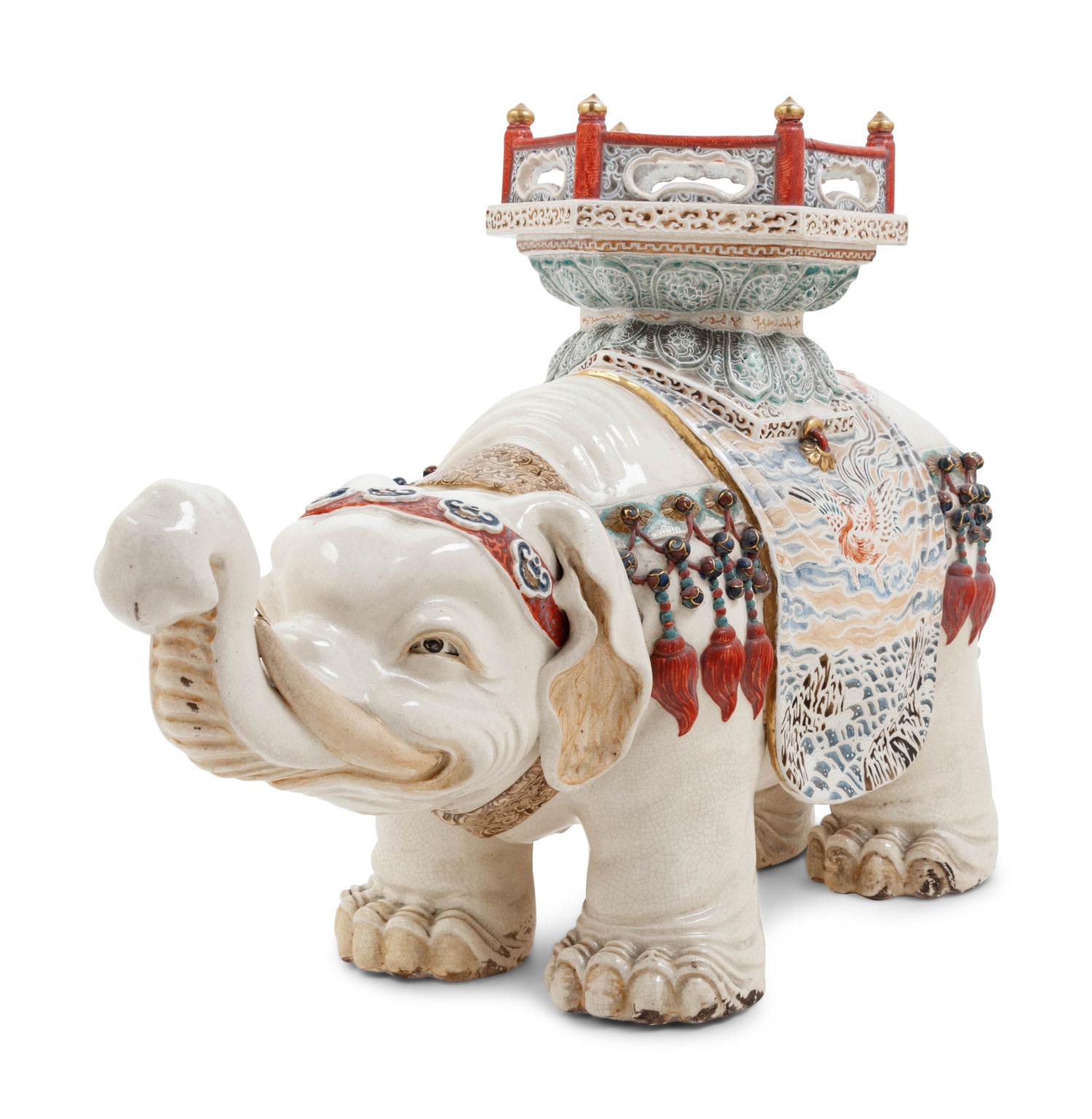 A Chinese Export Porcelain Model of a Caparisoned Elephant with Guanyin