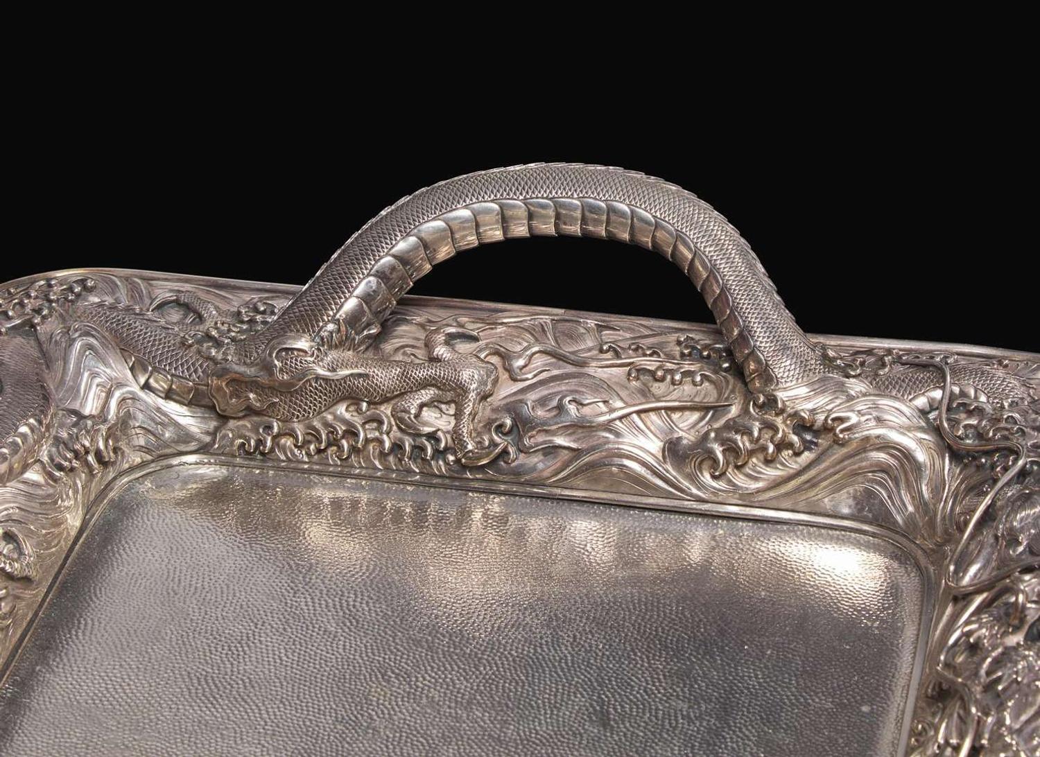 An impressive Japanese export silver four-piece "Dragon" tea and coffee service with tray, retailed by Arthur & Bond, Yokohama, late 19th/early 20th century 日式銀質咖啡器茶具四件及托盤 十九世紀末或二十世紀初