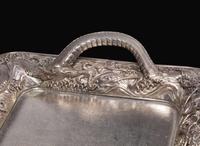 An impressive Japanese export silver four-piece "Dragon" tea and coffee service with tray, retailed by Arthur & Bond, Yokohama, late 19th/early 20th century 日式銀質咖啡器茶具四件及托盤 十九世紀末或二十世紀初