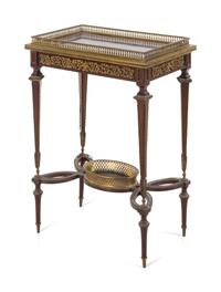A Louis XVI Style Gilt Bronze Mounted Mahogany Table