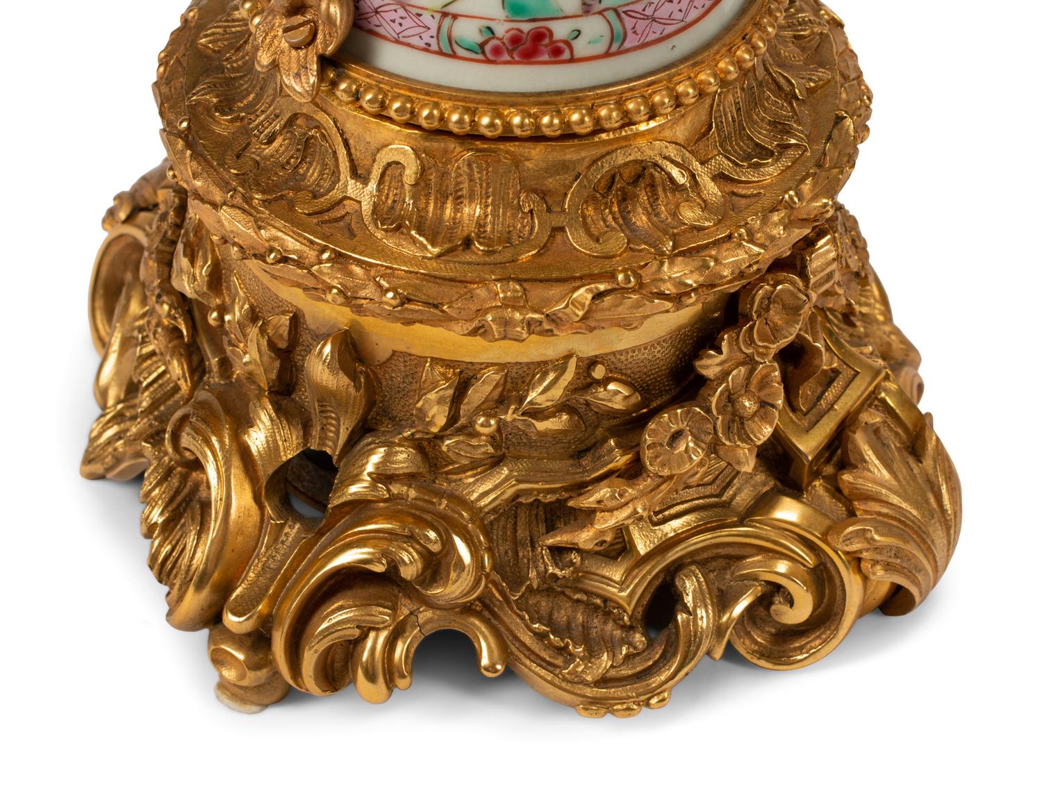 A Pair of Chinese Export Porcelain and Gilt Bronze Candelabra