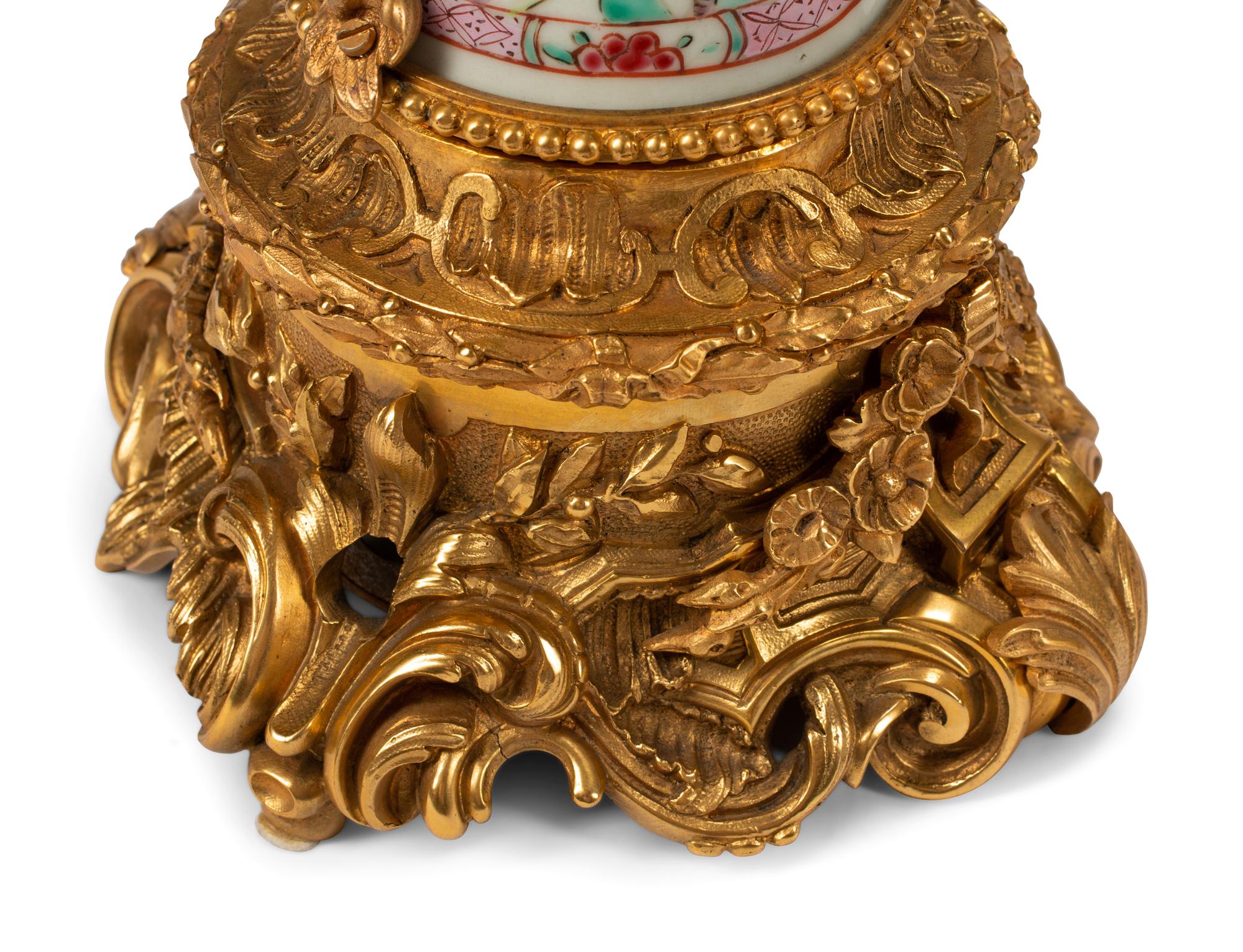 A Pair of Chinese Export Porcelain and Gilt Bronze Candelabra