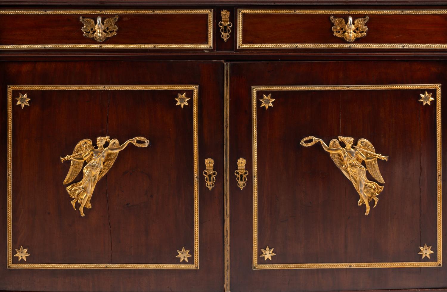 An Empire Style Gilt Bronze Mounted Mahogany Serving Cabinet